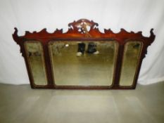 A Chippendale triple mirror.