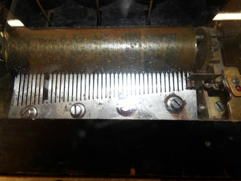 A Victorian music box with bells, in working order but one tooth and some tips missing from comb. - Image 3 of 4