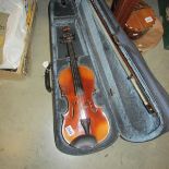 A good old violin inlaid with mother of pearl and different woods, no makers mark (in modern case).