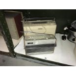 A vintage Roberts PP26-B radio and a Grundig TK6 reel to reel tape recorder.
