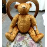 A vintage jointed Teddy bear.