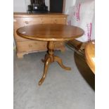 A good quality oak tripod table.