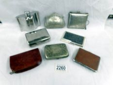 A mixed lot of silver plate purses, cigarette cases etc.