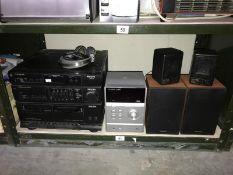 A Panasonic CD player, a Philips music centre, PR op uni-tone speakers and head phones.