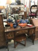 A 1930's triple mirror dressing table
