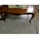 A mahogany coffee table.