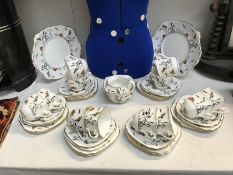 A Tudor porcelain tea set (40 pieces) sugar bowel AF