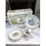 A boxed Wedgewood Peter Rabbit nursery set (box slightly A/F)