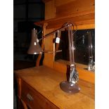 A vintage angle poise lamp.