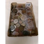 A mixed lot of UK and foreign coins.