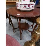 A mahogany occasional table.