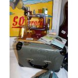 A boxed Essex miniature sewing machine, in excellent condition and possibly never used.