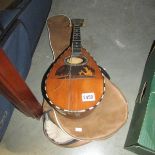 An old mandolin inlaid with mother of pearl and various timbers.