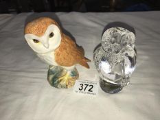 A Beswick owl and a Royal Crystal rock owl.