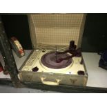 A cased Regentone record player.