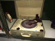 A cased Regentone record player.