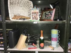 2 shelves of miscellaneous items, including kitchen items.