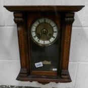 A small Victorian mahogany 8 day wall clock in working order.