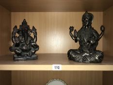 A Terracotta figure of Ganesh and a resin figure of Vishnu.