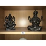 A Terracotta figure of Ganesh and a resin figure of Vishnu.