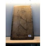 A 20th century poker work wooden plaque of a classical woman
