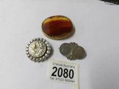 2 Victorian silver brooches and a Victorian agate brooch,