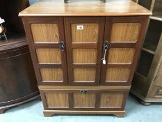 A mahogany television cabinet.