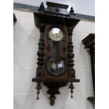 A Victorian mahogany 8 day wall clock, in working order.