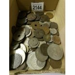 A mixed lot of 19th and 20th century world coins including Britain, Mexico, France, Switzerland,