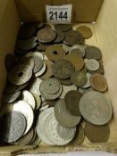 A mixed lot of 19th and 20th century world coins including Britain, Mexico, France, Switzerland,