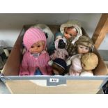 A collection of 9 dolls including Roody black plastic doll and Pedigree.