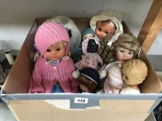 A collection of 9 dolls including Roody black plastic doll and Pedigree.