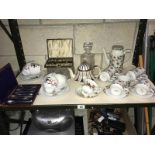 A mid winter daisy tea set and other tea ware and a cased silver plated spoon set.
