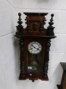 A Victorian mahogany 8 day wall clock. In working order,.
