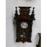 A Victorian mahogany 8 day wall clock. In working order,.