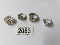 4 deco style silver rings.