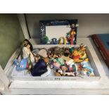 A quantity of Disney Christmas ornaments (2 AF) and a 2001 Disney photo frame.