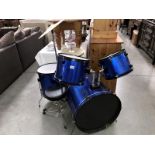 An adult drum kit.