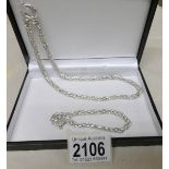 A fancy neck chain in a twisted design with matching bracelet in silver, made in Italy,