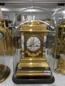 A 19th century French gild mantle clock featuring Sevres panels, named R. M.