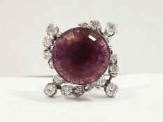 A stunning 9ct white gold rind set diamond and large amethyst.