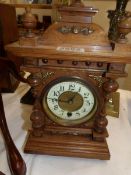 An oak mantel clock.