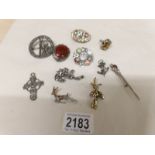 A small collection of vintage brooches.