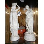 2 Grecian style parian figures.