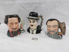 3 Royal Doulton character jugs being Charlie Chaplin, Charles Dickens and Merlin.