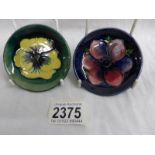 2 Moorcroft pin dishes (8 cm diameter).