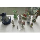 A Blue Burleigh Toby jug and a mixed lot of figures.