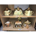 A quantity of cottage ware butter dishes, sugar bowls etc.