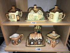 A quantity of cottage ware butter dishes, sugar bowls etc.