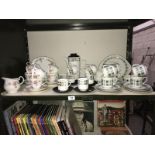 2 tea sets and a coffee set